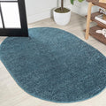 JONATHAN Y Haze Solid Low-Pile Turquoise 4x6 Oval Indoor Area Rug, Minimalist by JONATHANY